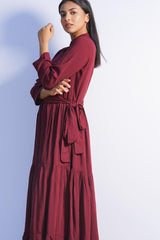 Side view of maroon long frock with flare – modern maxi dress for festive gatherings