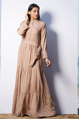 Stylish beige long frock with modern silhouette – perfect for evening wear and family gatherings