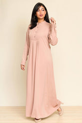 Skin color maxi dress with simple silhouette – elegant western wear for women in Pakistan