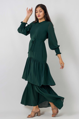 Side view of green skirt and top set – flowy silhouette with contemporary design