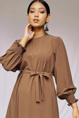 Close-up of neckline and fabric on short frock – soft material with refined stitching and modern cut
