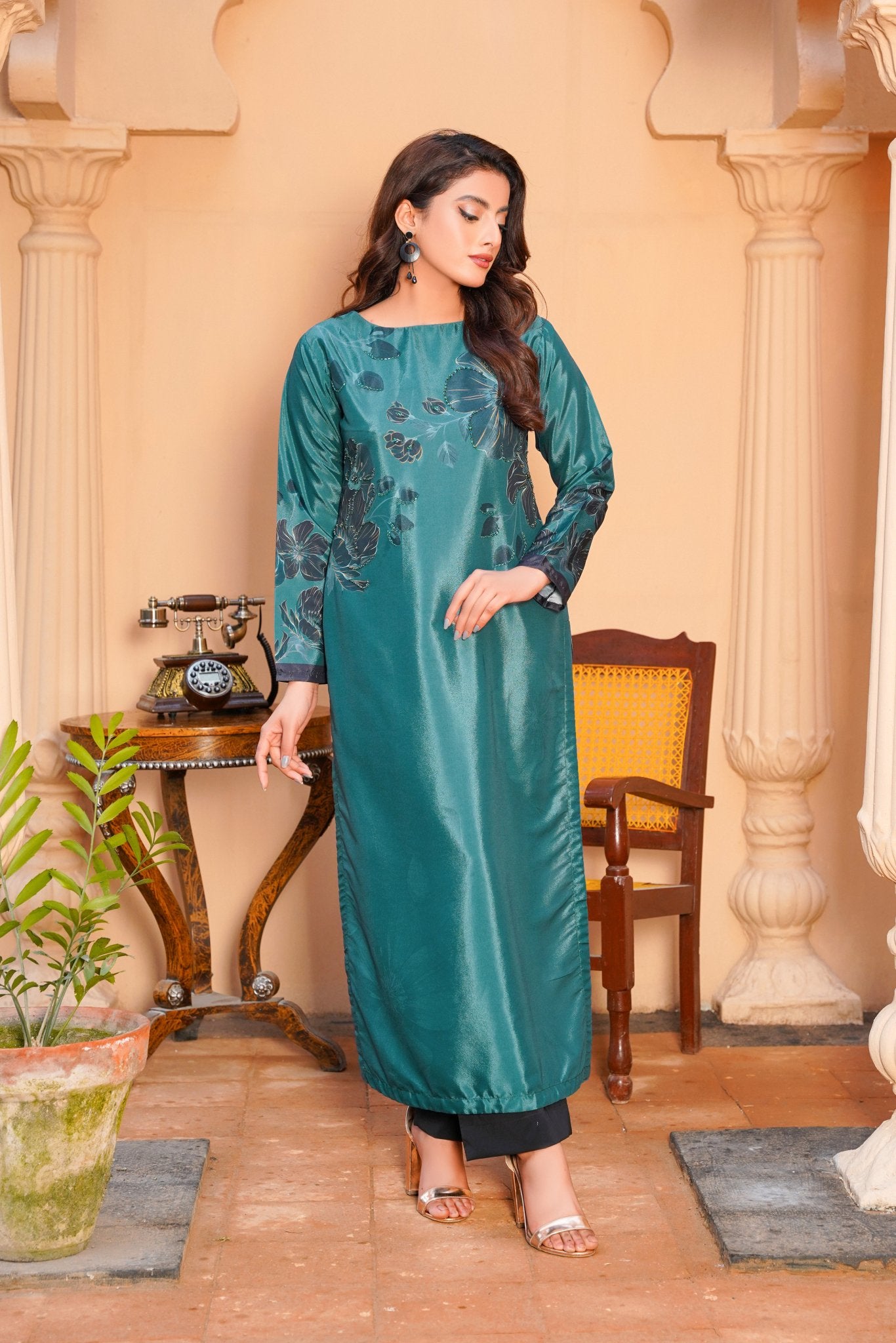 women dresses, Celebrate sophistication in our Teal Green Long Shirt. Crafted with finesse from premium fabric, its rich hue captivates. Versatile and elegant, this piece promises to elevate your style with effortless grace.