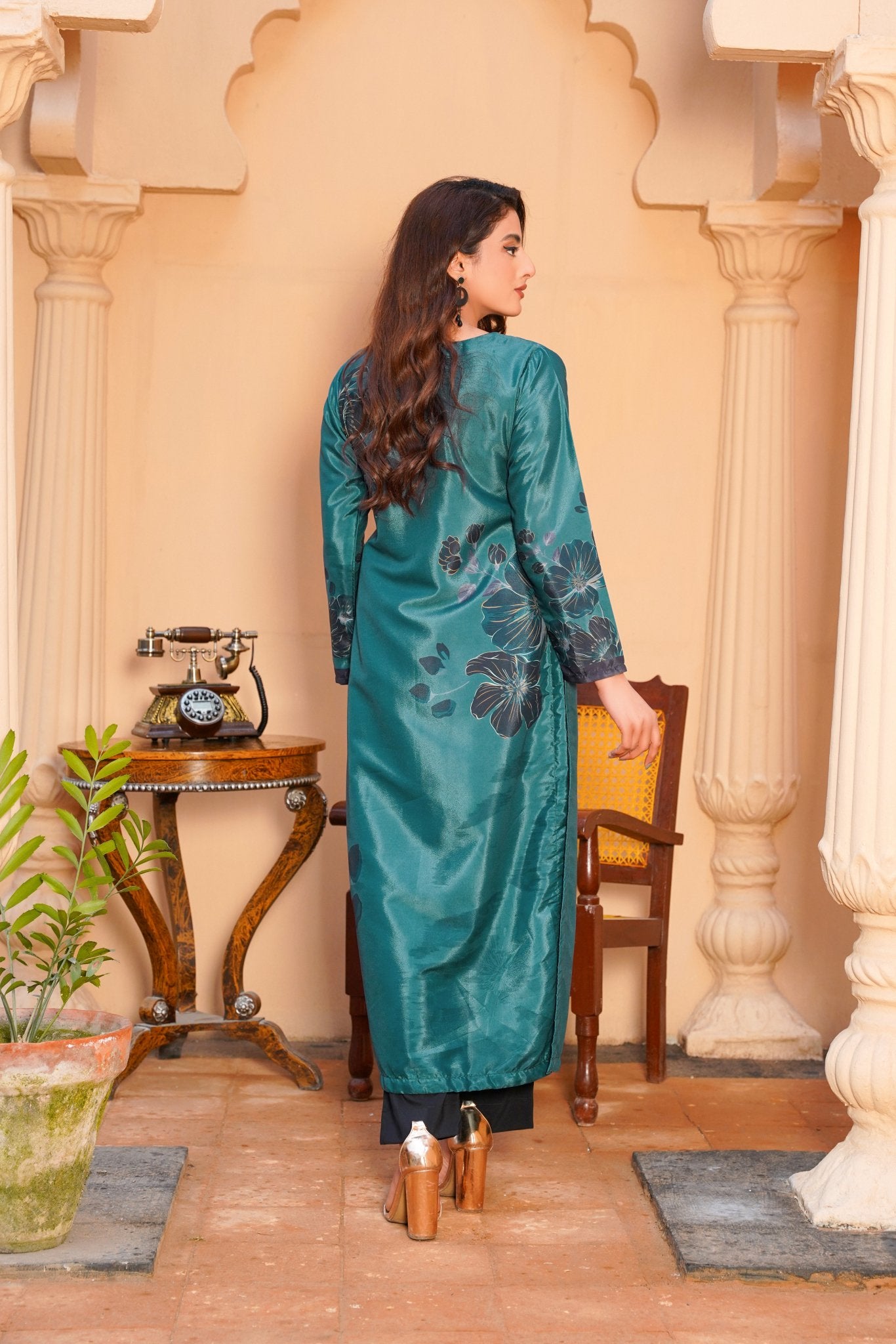 women dresses, Celebrate sophistication in our Teal Green Long Shirt. Crafted with finesse from premium fabric, its rich hue captivates. Versatile and elegant, this piece promises to elevate your style with effortless grace.