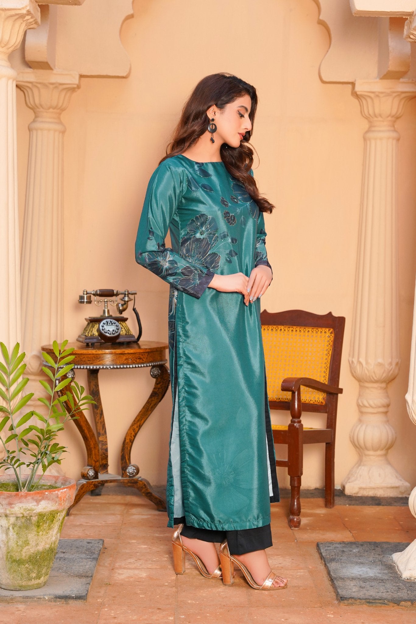 women dresses, Celebrate sophistication in our Teal Green Long Shirt. Crafted with finesse from premium fabric, its rich hue captivates. Versatile and elegant, this piece promises to elevate your style with effortless grace.